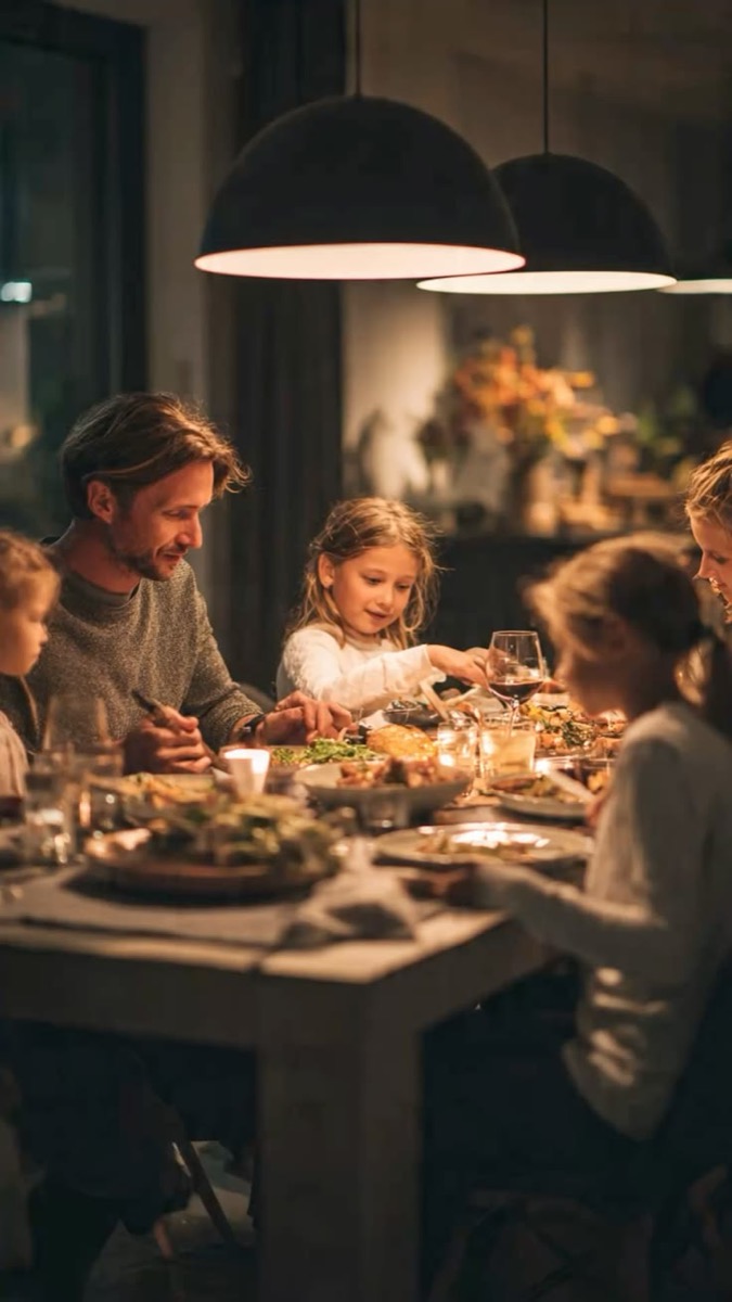 A family sharing bread around the table