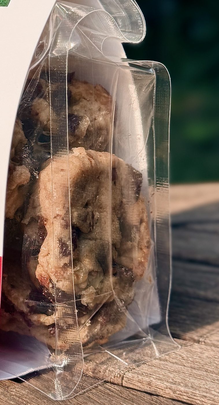 A pastry bite with black coffee