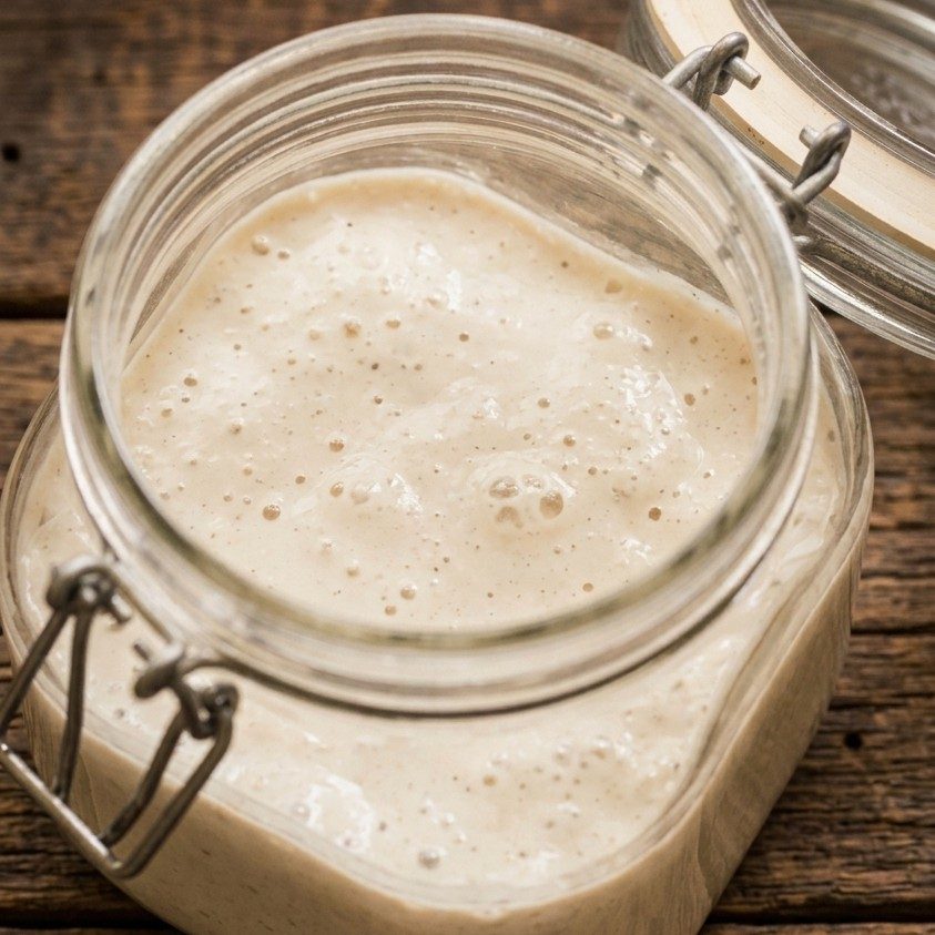 A jar of active wild sourdough starter